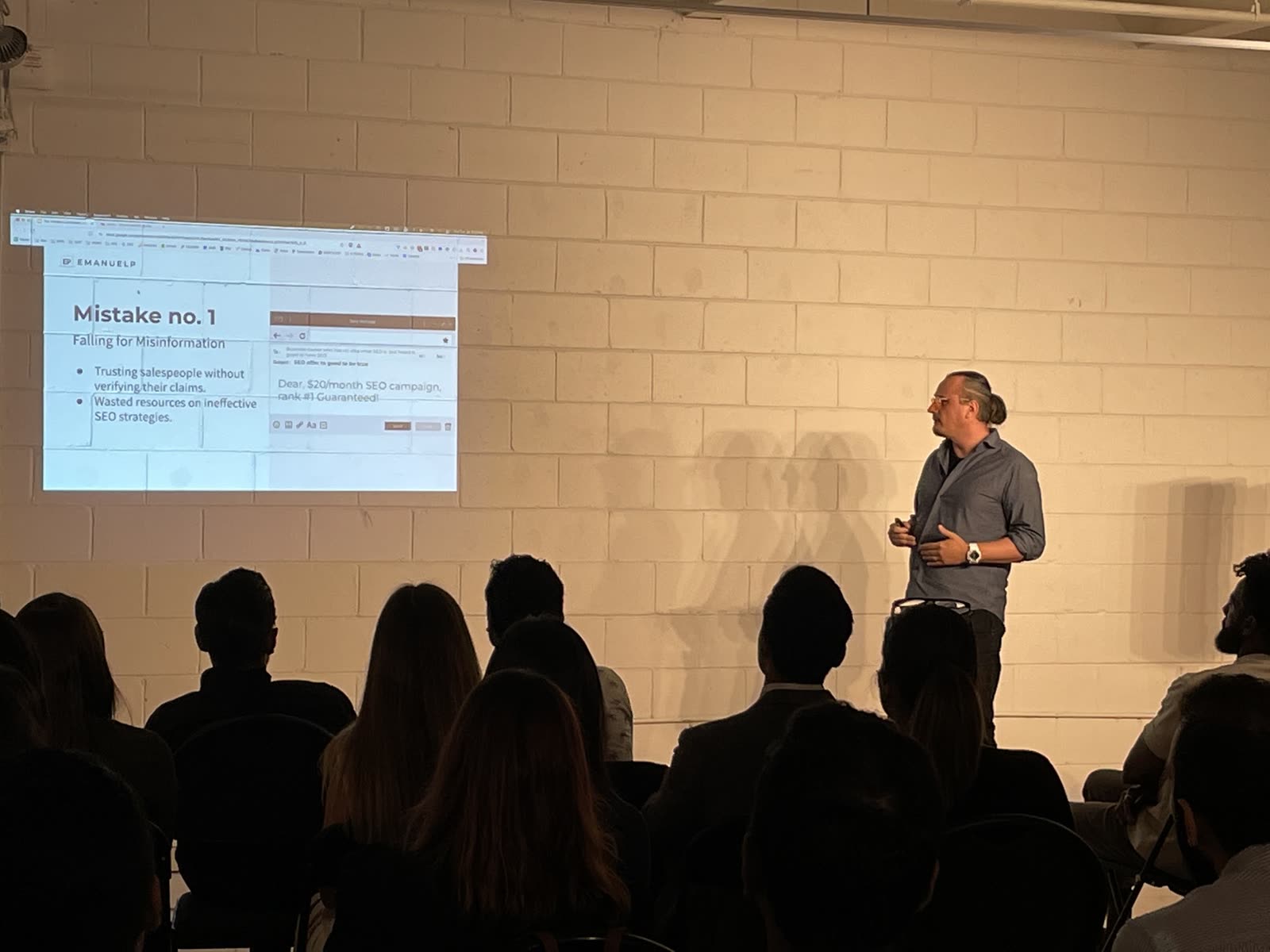 Emanuel Petrescu speaking to a Toronto audience about digital marketing